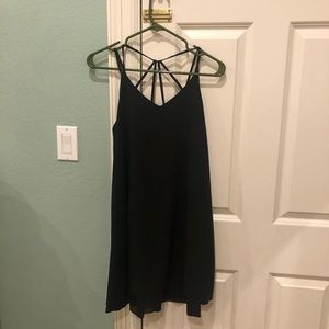 The Impeccable Pig Black Mini Dress